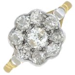 An old-cut diamond cluster ring.