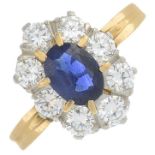 An oval-shape sapphire and brilliant-cut diamond cluster ring.Sapphire calculated weight 0.29ct,
