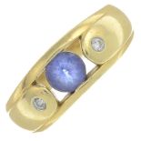 A circular-shape tanzanite and brilliant-cut diamond ring.Stamped 18k.Ring size M.