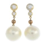 A pair of cultured pearl and brilliant-cut diamond earrings.Cultured pearls measuring