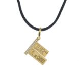 A brilliant-cut diamond 'E 52nd' street sign pendant,