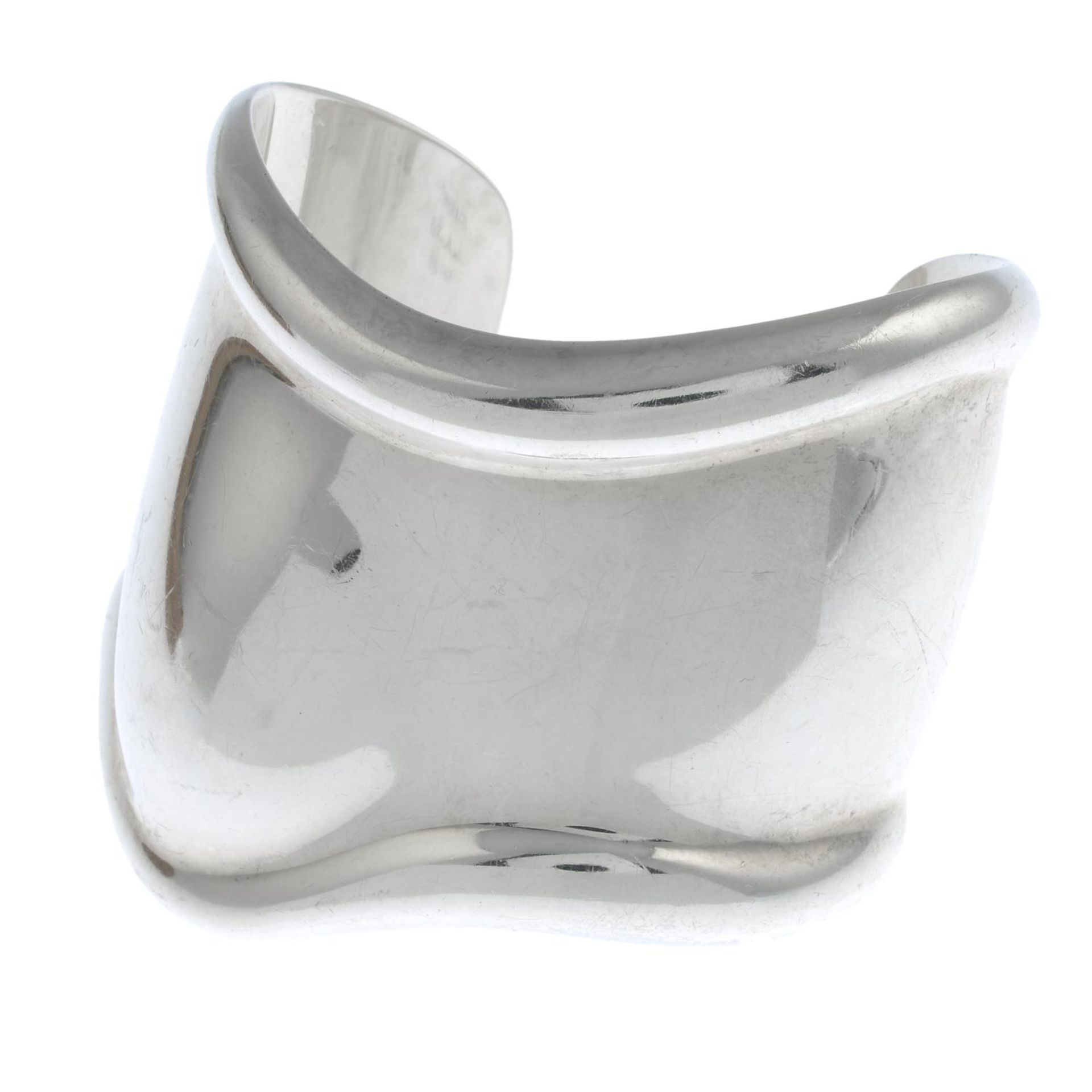 A 'Bone' cuff, by Elsa Peretti for Tiffany & Co.Signed Tiffany & Co.,