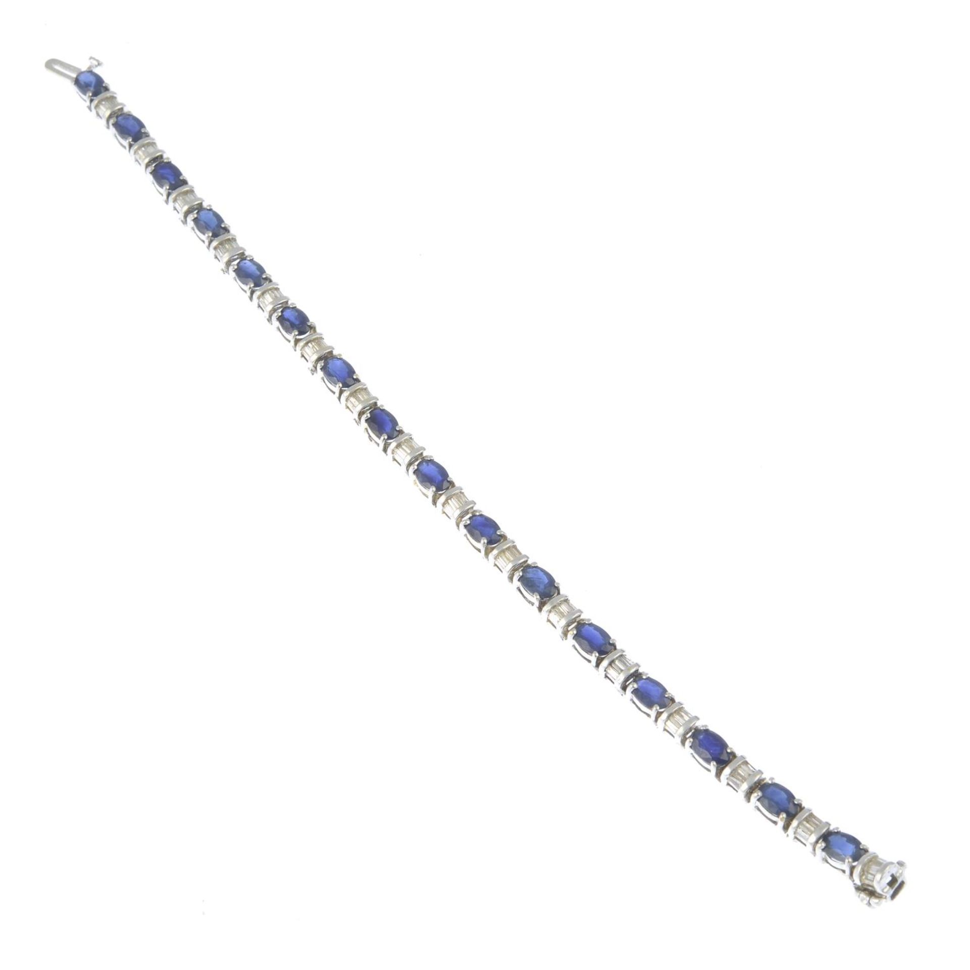 A 14ct gold sapphire and baguette-cut diamond line bracelet.Estimated total diamond weight - Bild 2 aus 3