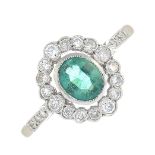 An emerald and old-cut diamond cluster ring.Emerald calculated weight 0.52ct,
