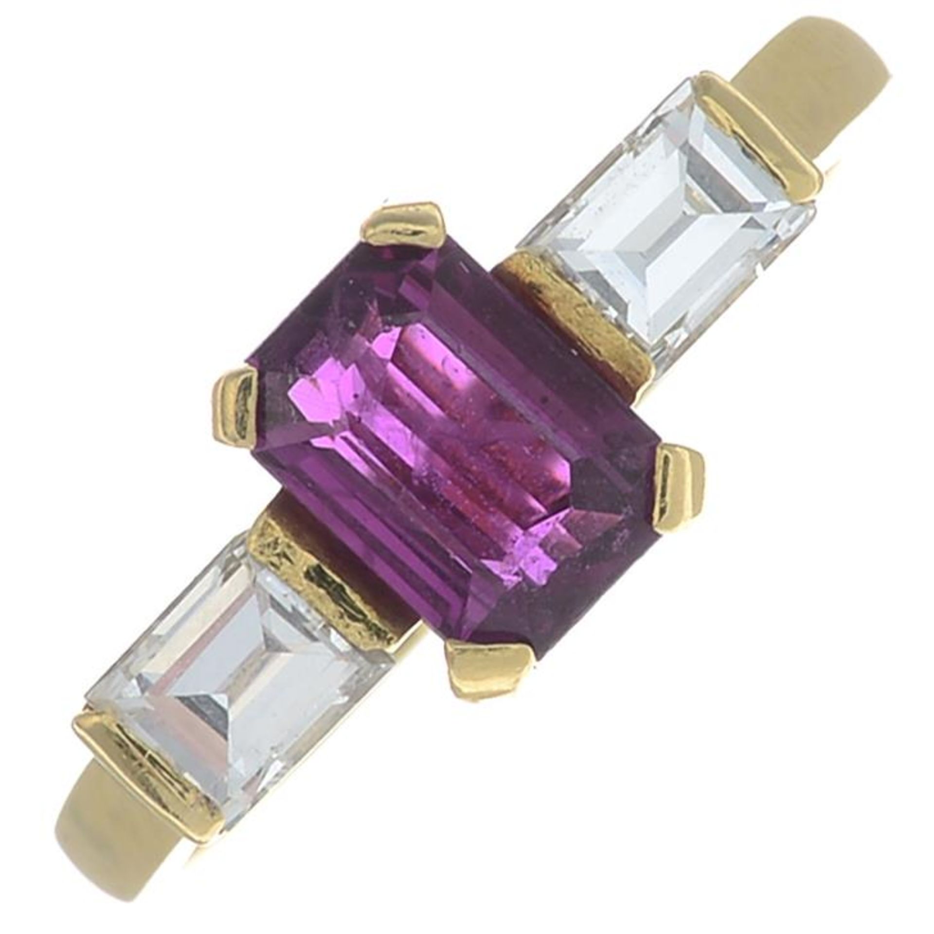 An 18ct gold rectangular-shape ruby and diamond three-stone ring.Ruby calculated weight 1.11cts,