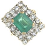 A 1970's 18ct gold emerald and diamond cluster ring.Emerald calculated weight 2.42cts,