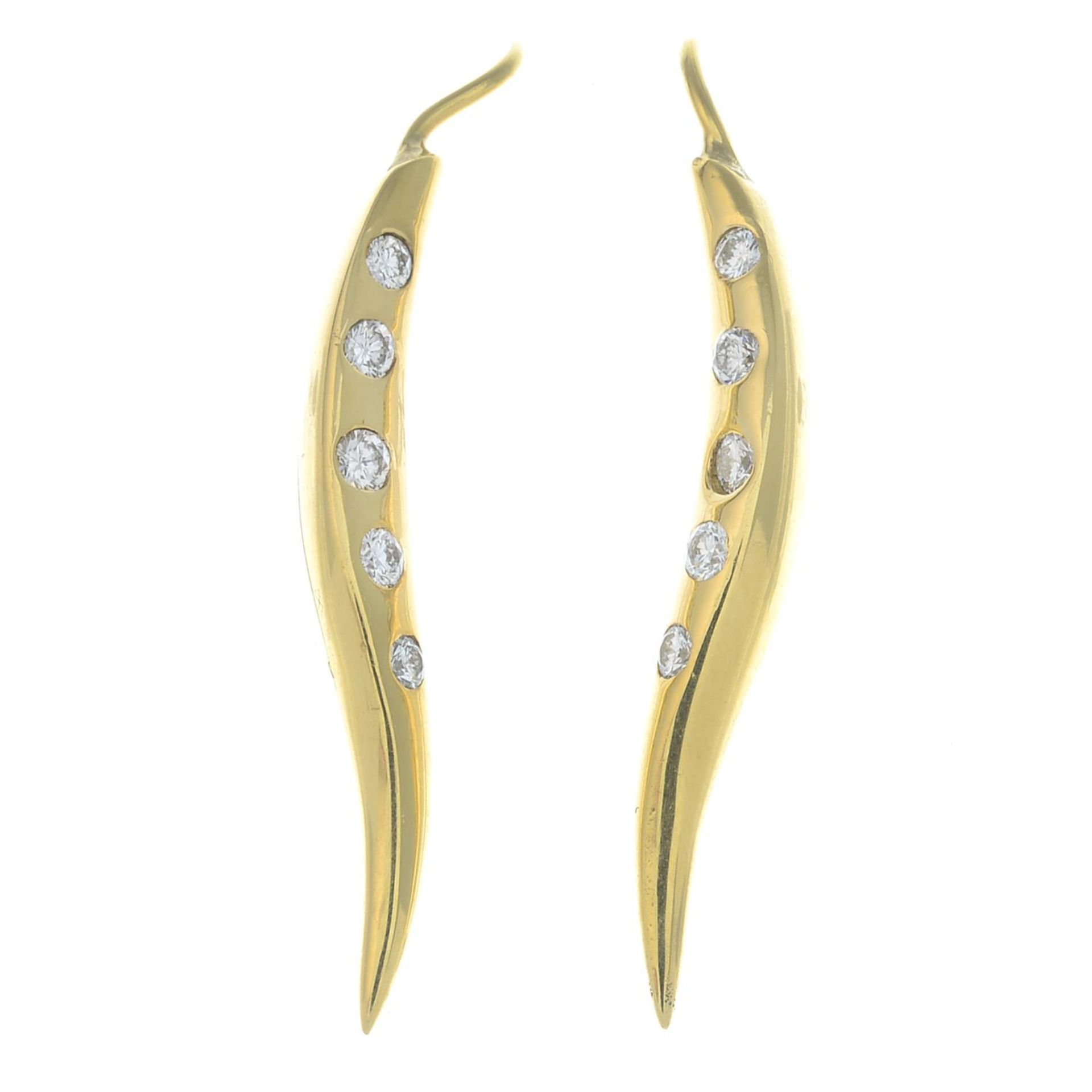 A pair of 18ct gold brilliant-cut diamond curved earrings.Estimated total diamond weight