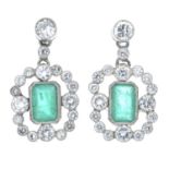 A pair of emerald and brilliant-cut diamond drop earrings.Total emerald weight 0.84ct,