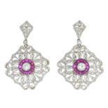 A pair of vari-shape ruby and brilliant-cut diamond earrings.Estimated total principal diamond