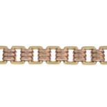 A 1940s 9ct gold bi-colour bracelet.Stamped 9CT.