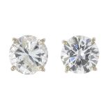 A pair of brilliant-cut diamond stud earrings.Total diamond weight 2.71cts,