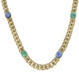 An 18ct gold curb-link necklace, with sapphire and emerald cabochon highlights.