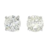 A pair of 18ct gold brilliant-cut diamond stud earrings.Estimated total diamond weight 1.10cts,