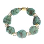 An early 20th century 18ct gold turquoise bracelet.Approximate dimensions of one turquoise 19 by