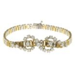 An 18ct bi-colour gold diamond bracelet.Estimated total diamond weight 1.70cts.Hallmarks for