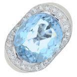 An aquamarine and brilliant-cut diamond dress ring.Aquamarine calculated weight 10.85cts,