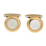 A pair of 18ct gold enamel cufflinks,