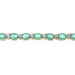 An emerald bracelet with single-cut diamond double spacers.Total emerald weight 8.28cts,