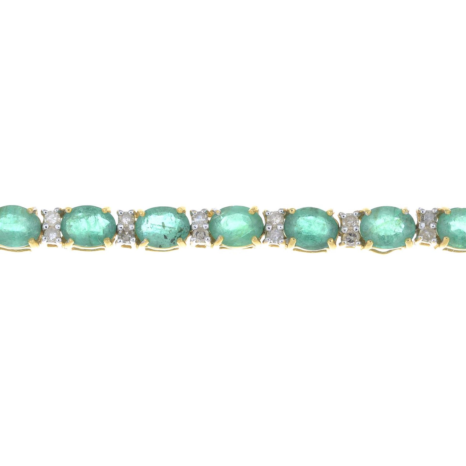 An emerald bracelet with single-cut diamond double spacers.Total emerald weight 8.28cts,