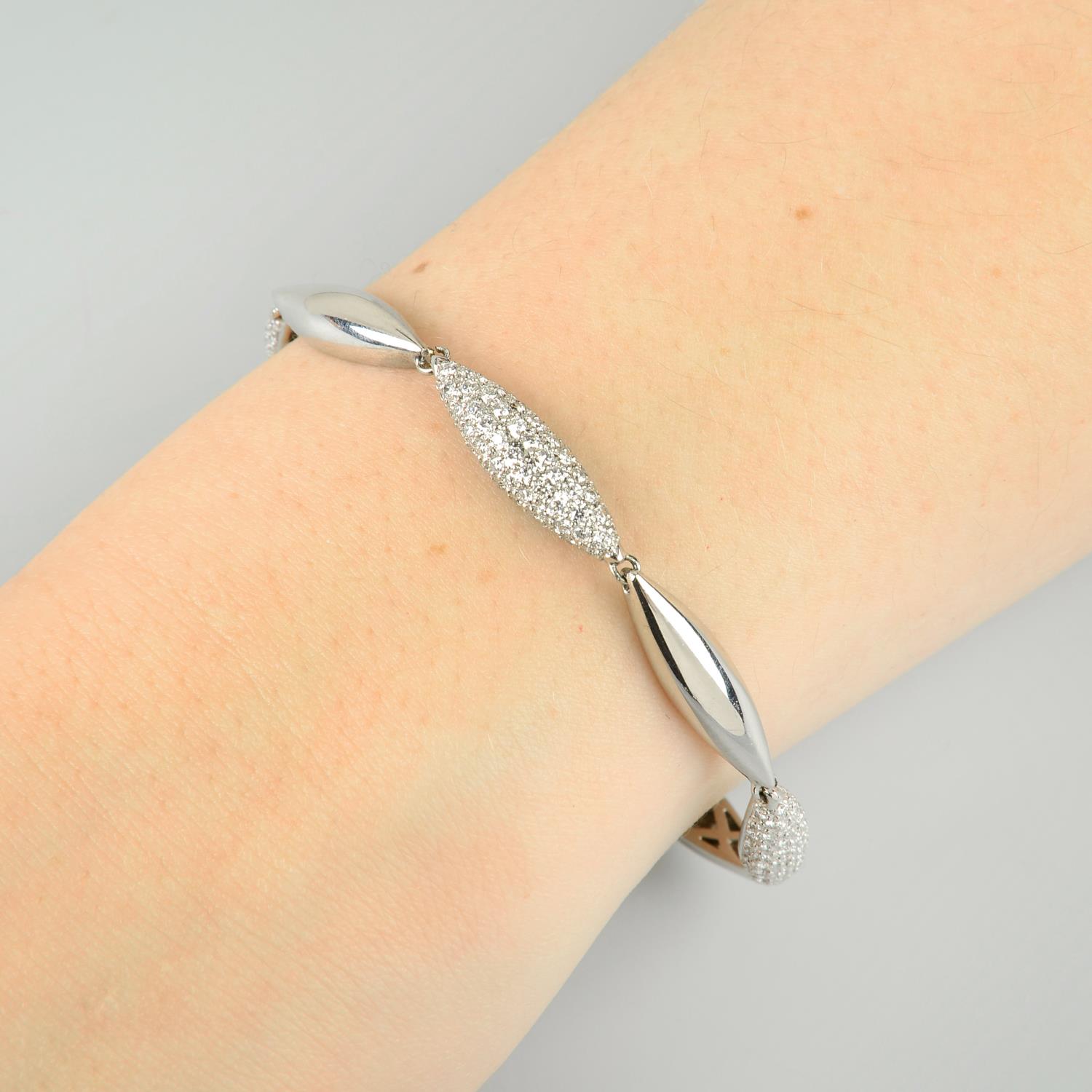 An 18ct gold pave-set diamond bracelet. - Image 5 of 5