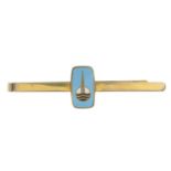 A mid 20th century 18ct gold enamel tiepin,