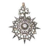 A late 19th century silver and gold old and rose-cut diamond pendant.Estimated principal old-cut