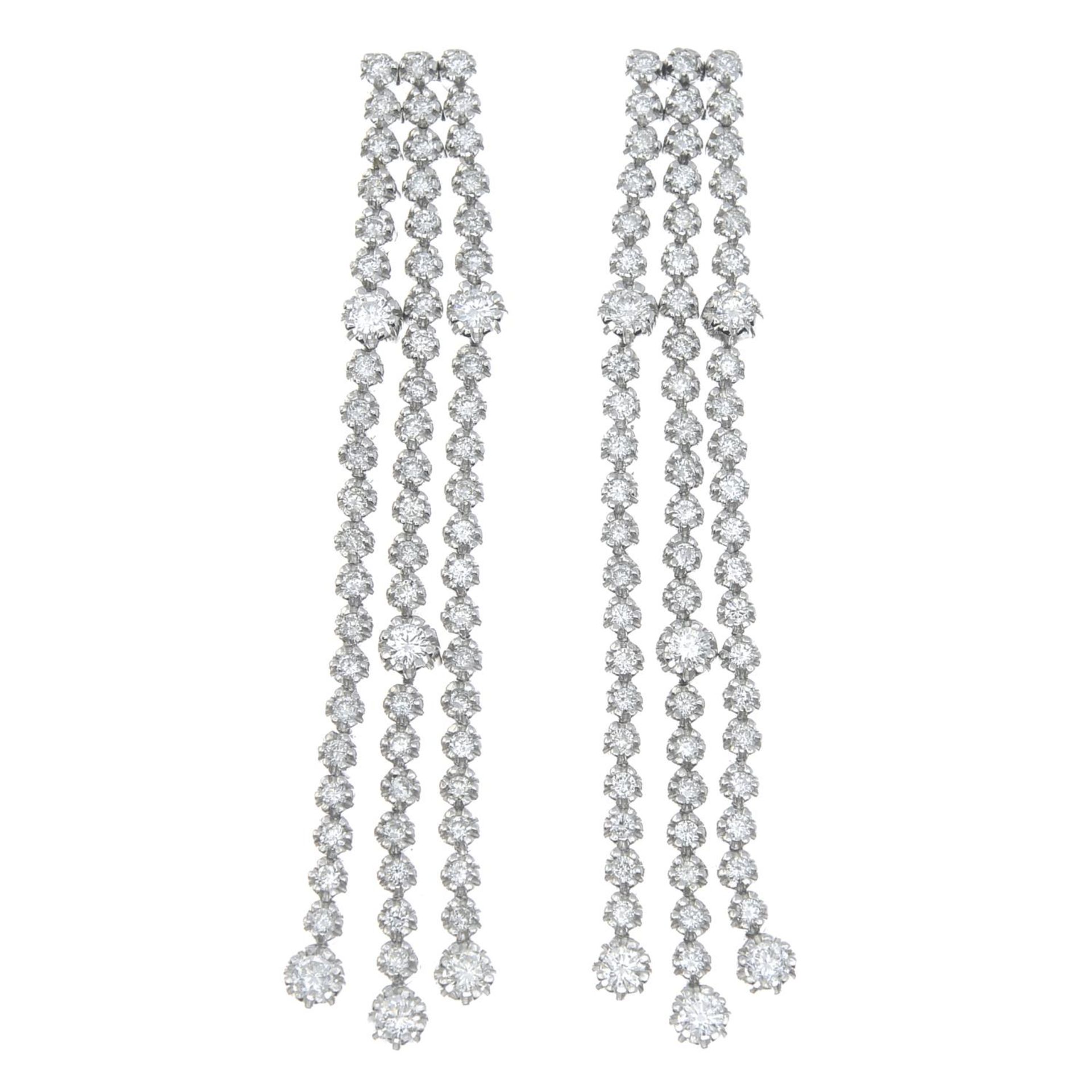 A pair of brilliant-cut diamond line drop earrings.Estimated total diamond weight 2cts,