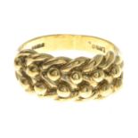 A 9ct gold keeper ring.Hallmarks for 9ct gold.