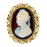 A late 19th century banded agate cameo brooch, with cultured pearl surround.Length 4.3cms.