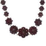 A late 19th century garnet necklace.Length 44cms.