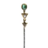 An emerald and diamond stickpin.Estimated total diamond weight 0.10ct.