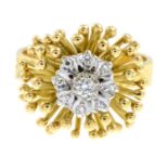 A 1970s 18ct gold diamond floral ring.Estimated total diamond weight 0.15ct.