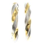 A pair of 9ct gold bi-colour hoop earrings.Hallmarks for 9ct gold.