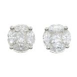 A pair of vari-cut diamond stud earrings.Estimated total diamond weight 0.80ct,