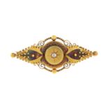 A late Victorian 15ct gold cannetille brooch, with old-cut diamond accent.