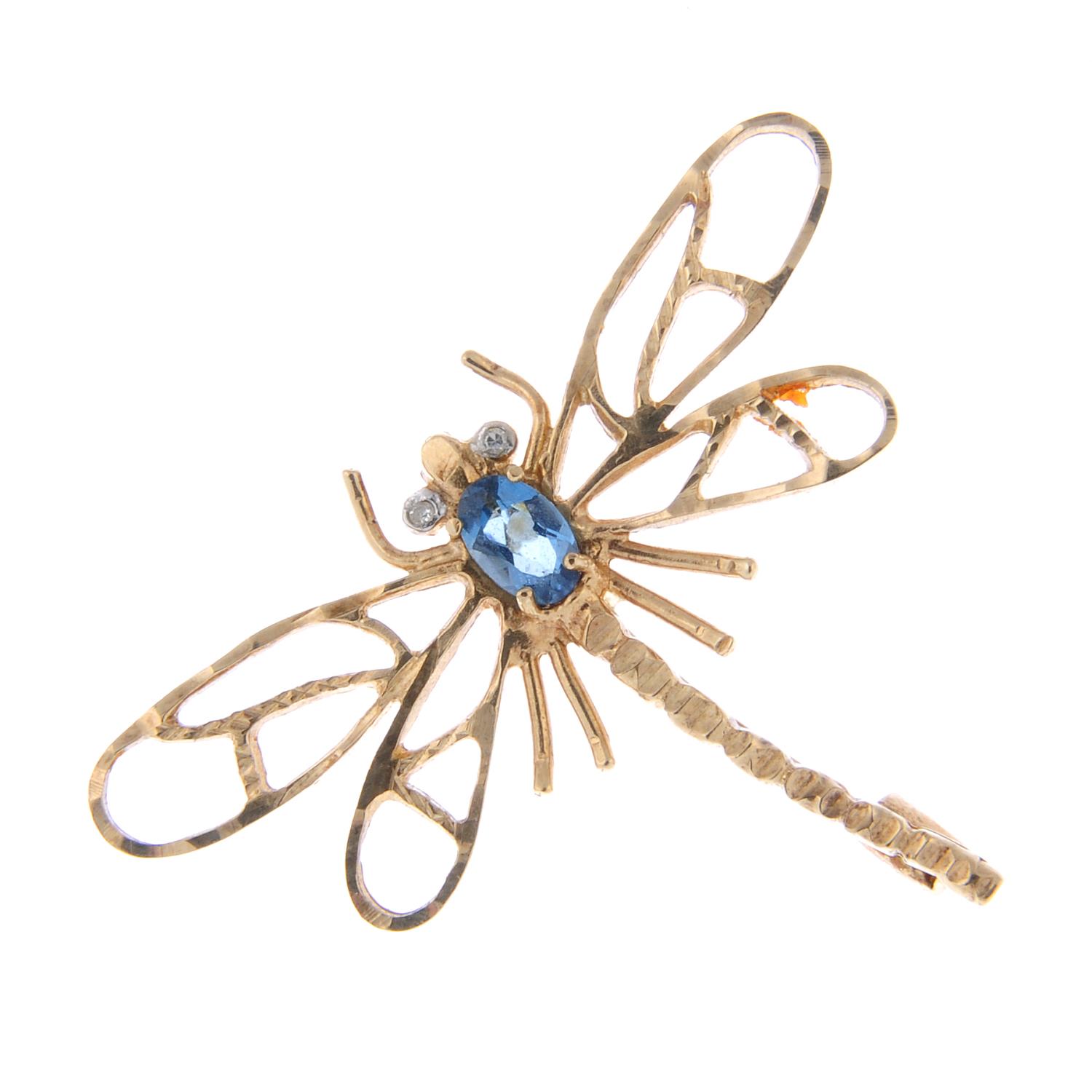 A blue topaz and diamond dragonfly brooch.Length 3.4gms.