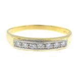 An 18ct gold diamond half eternity ring.Estimated total diamond weight 0.15ct.