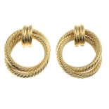 A pair of 9ct gold earrings.Hallmarks for 9ct gold.