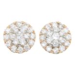 A pair of 18ct gold brilliant-cut diamond cluster earrings.Total diamond weight 0.77ct,