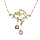 An Edwardian 15ct gold pearl and split pearl floral pendant,