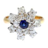 A diamond and sapphire floral cluster ring.Estimated total diamond weight 1.50cts.