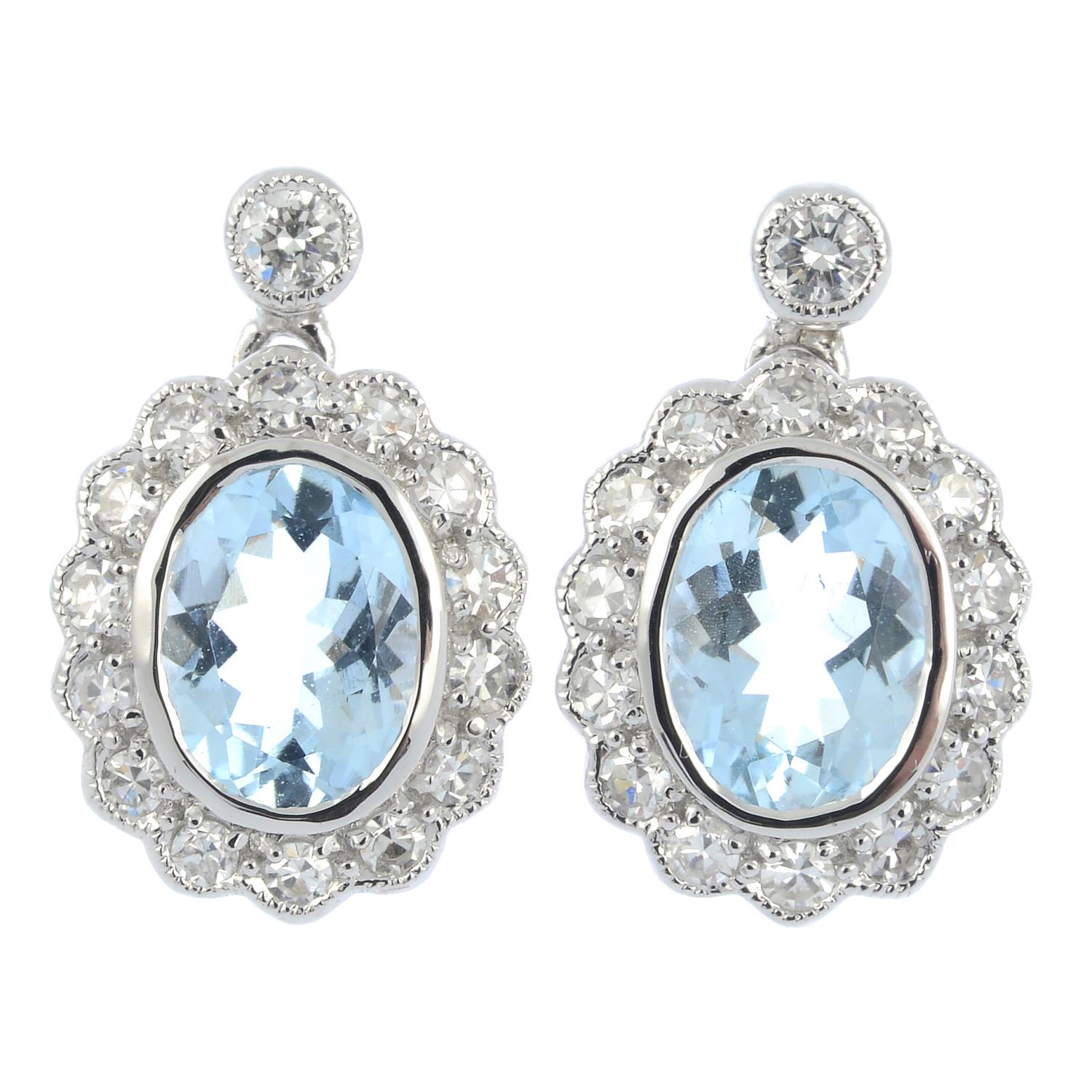 A pair of aquamarine and vari-cut diamond earrings.Estimated total diamond weight 0.65ct,