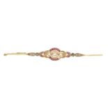 A rose-cut diamond, ruby and split pearl brooch.Length 7.7cms.