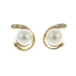 Four pairs of gold cultured pearl and diamond earrings.Estimated total diamond weight 0.10ct.