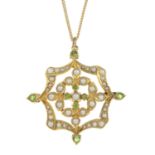 An Edwardian 15ct gold split pearl and demantoid garnet pendant,