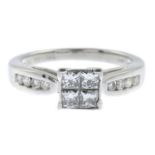 A platinum diamond dress ring.Total diamond weight 0.60ct, stamped to band.