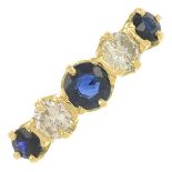 An 18ct gold sapphire and brilliant-cut diamond five-stone ring.Principal sapphire calculated
