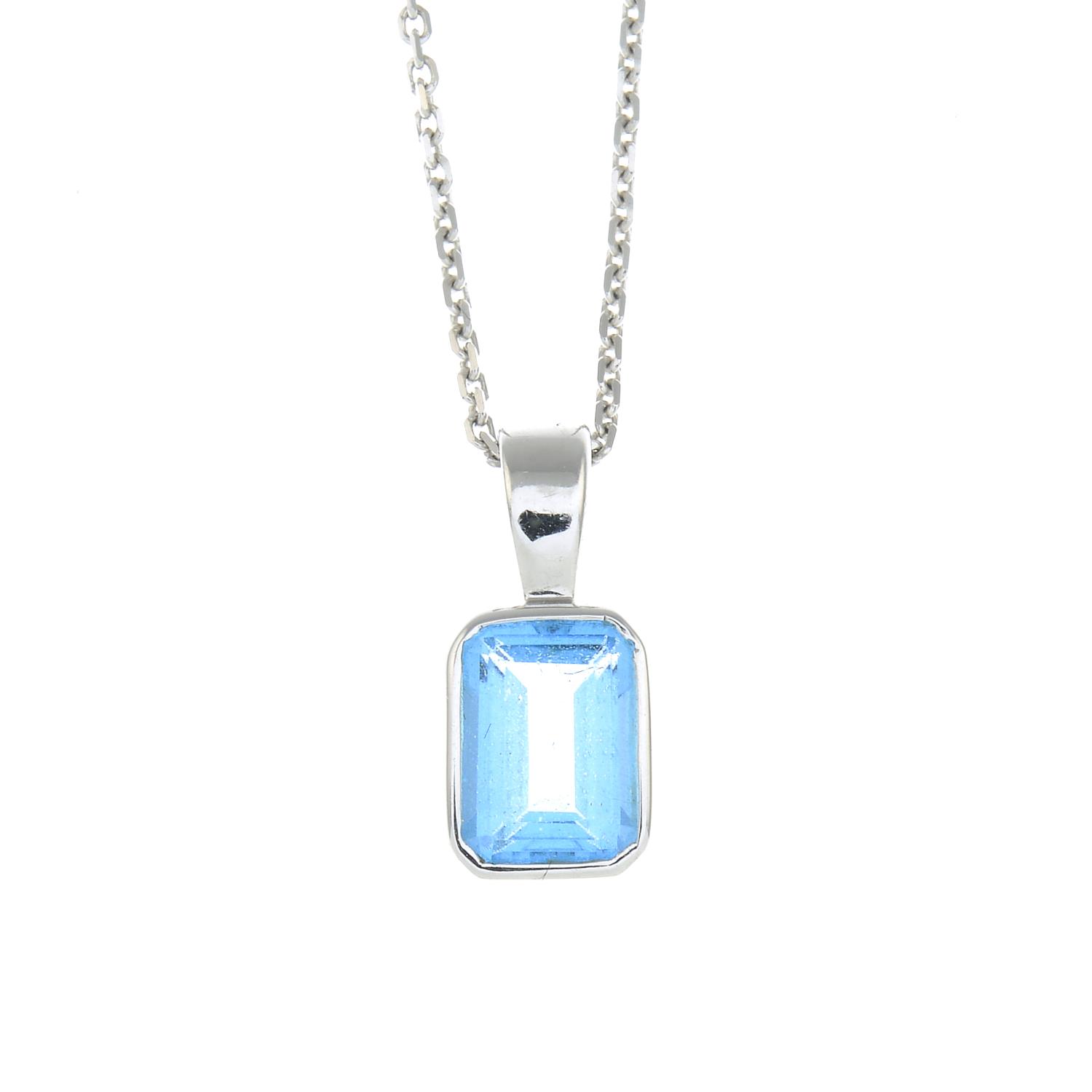 A blue topaz pendant, with 9ct gold chain.Chain with hallmarks for 9ct gold.