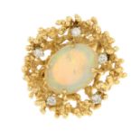 An opal and diamond abstract dress ring.Estimated total diamond weight 0.20ct,