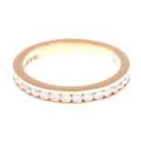 An 18ct gold brilliant-cut diamond full eternity ring.Estimated total diamond weight 1ct,